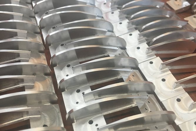 Machined antenna components after surface treatment