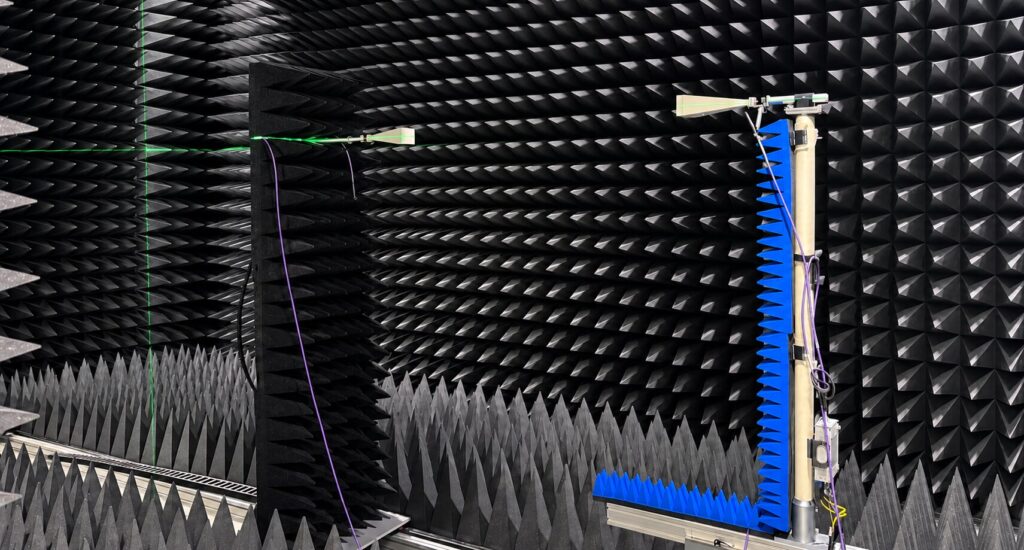 Fully anechoic chamber of RFspin Calibration Laboratory with two horn antennas aligned by laser for a gain calibration